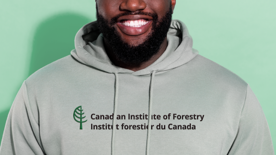 Hoodie Man wearing sweatshirt with CIF-IFC logo.