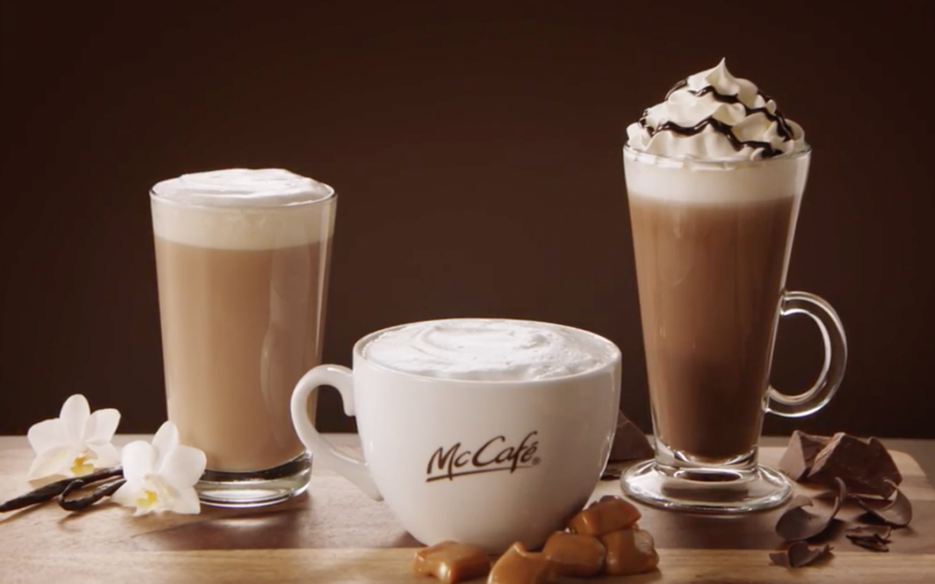 Product shot of McCafe French vanilla latter, caramel cappuccino, and cafe mocha.